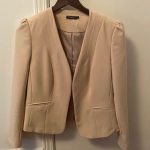 Van Heusen brand new women blazer, tag tored by child. Never worn